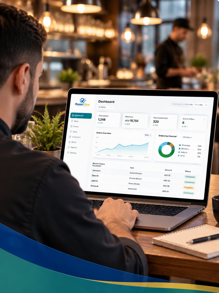 Restaurant owner managing the RazaX Dine admin dashboard on a laptop